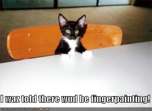 funny-pictures-kitten-desk-finger-painting.jpg